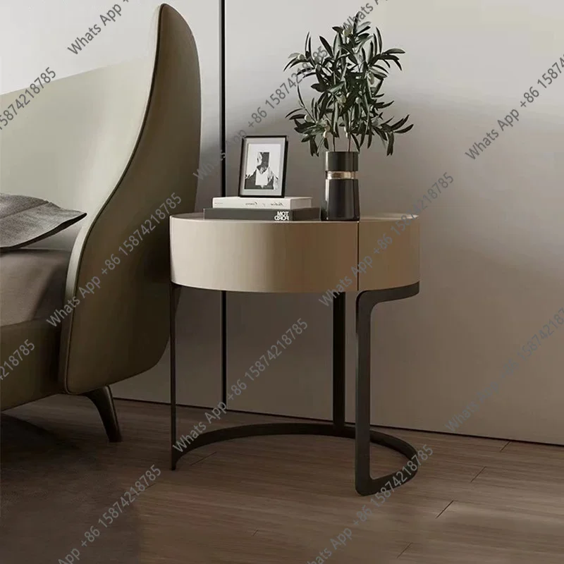 Creative light luxury bedside table Modern minimalist designer household Italian round minimalist bedside locker
Creative light luxury bedside table Modern minimalist designer household Italian round minimalist bedside locker
