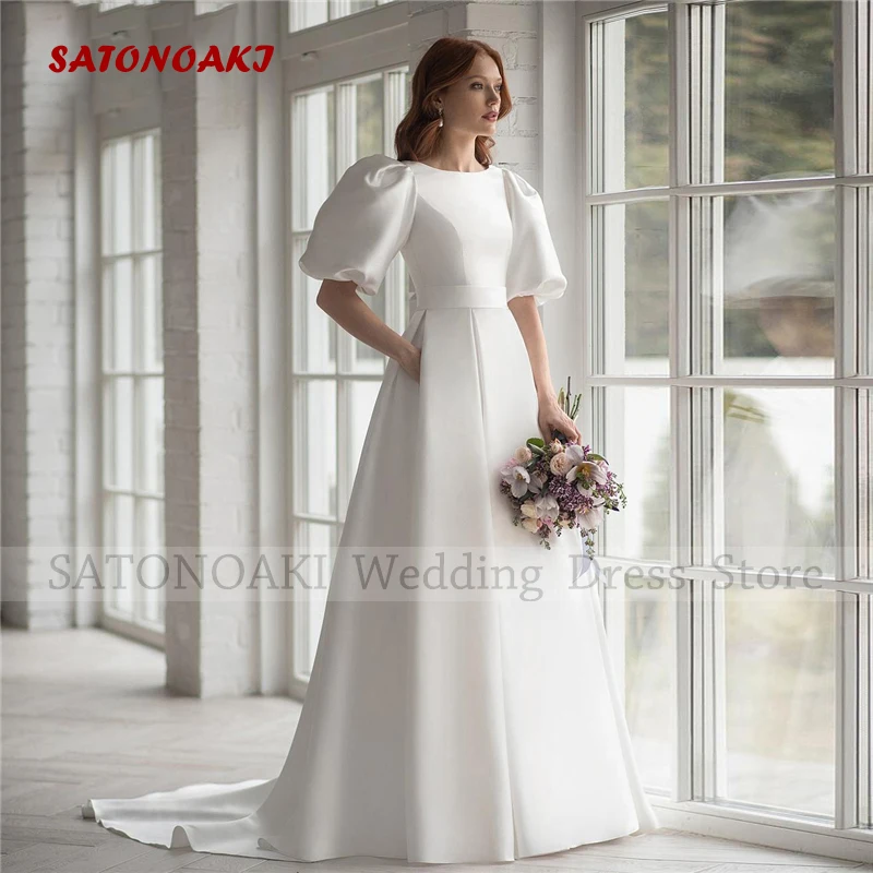 Elegant Puff Sleeve O-Neck Satin Wedding Dress for Women with Pocket A-Line Floor Length Bride Gown Vestido De Novia Custom Made
Elegant Puff Sleeve O-Neck Satin Wedding Dress for Women with Pocket A-Line Floor Length Bride Gown Vestido De Novia Custom Made