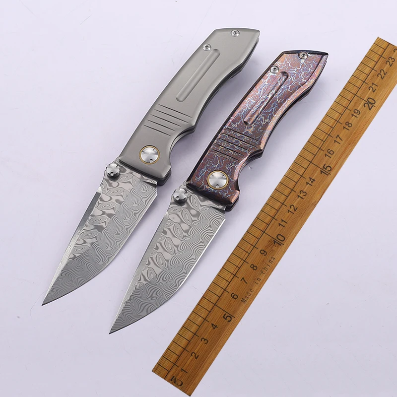 Damascus Steel Folding Knife with Titanium Alloy Handle Outdoor Survival Camping Hiking Portable EDC Tool
Damascus Steel Folding Knife with Titanium Alloy Handle Outdoor Survival Camping Hiking Portable EDC Tool