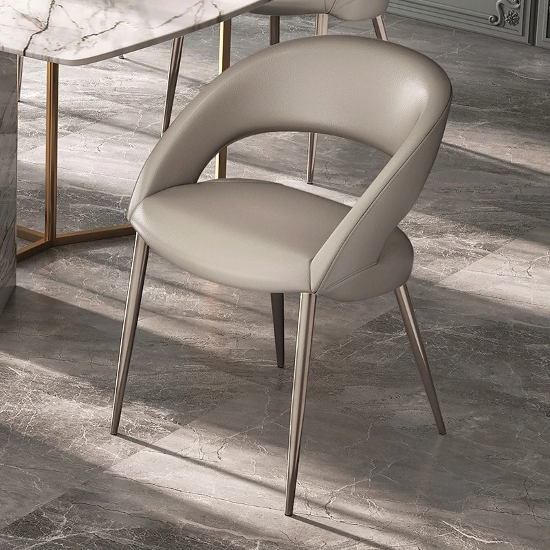 Modern leather minimalist soft bag, hollow dining chair, metal leg home dining chair
Modern leather minimalist soft bag, hollow dining chair, metal leg home dining chair