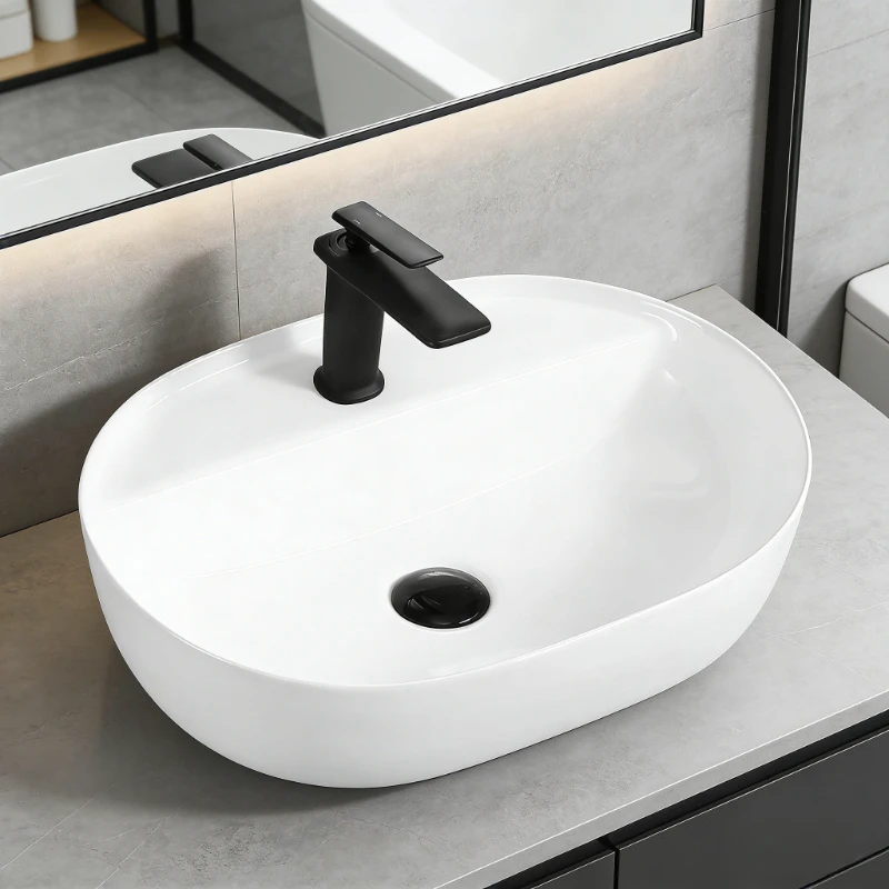Elegant Ceramic Vessel Sink Oval Design Ceramic Wash Basin Modern Bathroom Fixtures Suitable for Dressing Rooms Bathrooms
Elegant Ceramic Vessel Sink Oval Design Ceramic Wash Basin Modern Bathroom Fixtures Suitable for Dressing Rooms Bathrooms