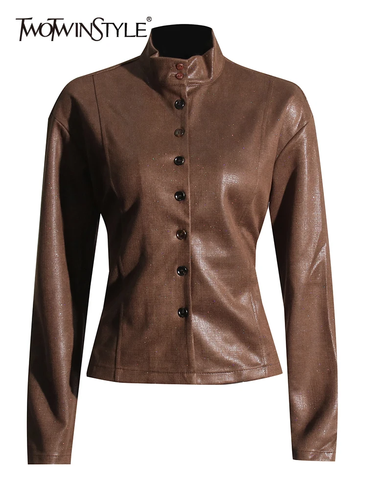TWOTWINSTYLE Solid Patchwork Lace Up Leather Coat Stand Collar Long Sleeve Spliced Single Breasted Vintage Coats Female Style
TWOTWINSTYLE Solid Patchwork Lace Up Leather Coat Stand Collar Long Sleeve Spliced Single Breasted Vintage Coats Female Style