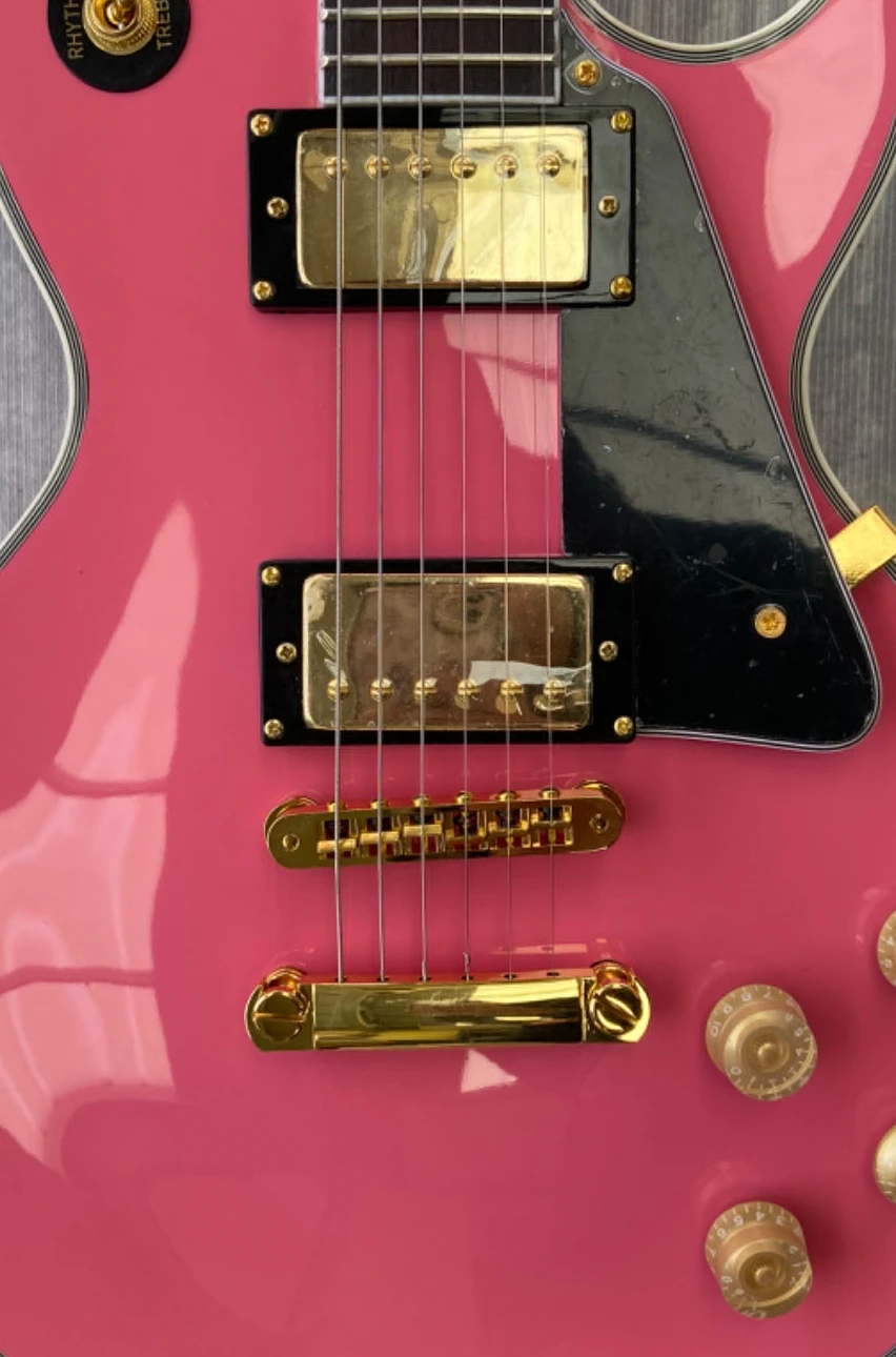 have logo Electric Guitar, pink opaque, Rosewood fingerboard Made in China
have logo Electric Guitar, pink opaque, Rosewood fingerboard Made in China