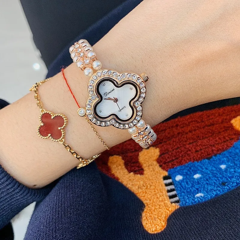 Женские часы Timini с бриллиантами, корейское издание, женские часы с жемчужными шипами и бриллиантовым браслетом, женские часы, темпераментные модные часы
Женские часы Timini с бриллиантами, корейское издание, женские часы с жемчужными шипами и бриллиантовым браслетом, женские часы, темпераментные модные часы