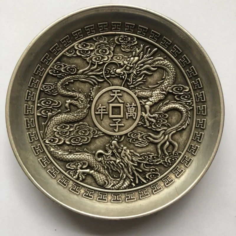 Антикварные старые товары Династия Цин Qianlong Императорский подарок Девять тарелок дракона Форма для денег Старая тибетская серебряная императорская вечная тарелка Retu
Антикварные старые товары Династия Цин Qianlong Императорский подарок Девять тарелок дракона Форма для денег Старая тибетская серебряная императорская вечная тарелка Retu