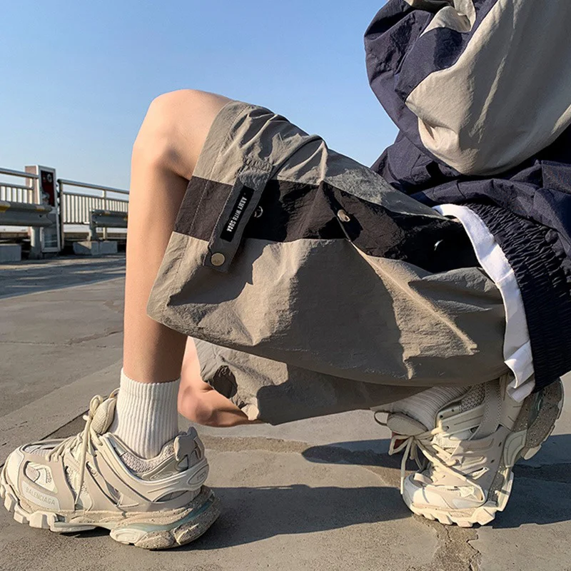 2023 American style thin ice silk breasted shorts for men's summer casual loose fitting high street quick drying wide leg sports
2023 American style thin ice silk breasted shorts for men's summer casual loose fitting high street quick drying wide leg sports
