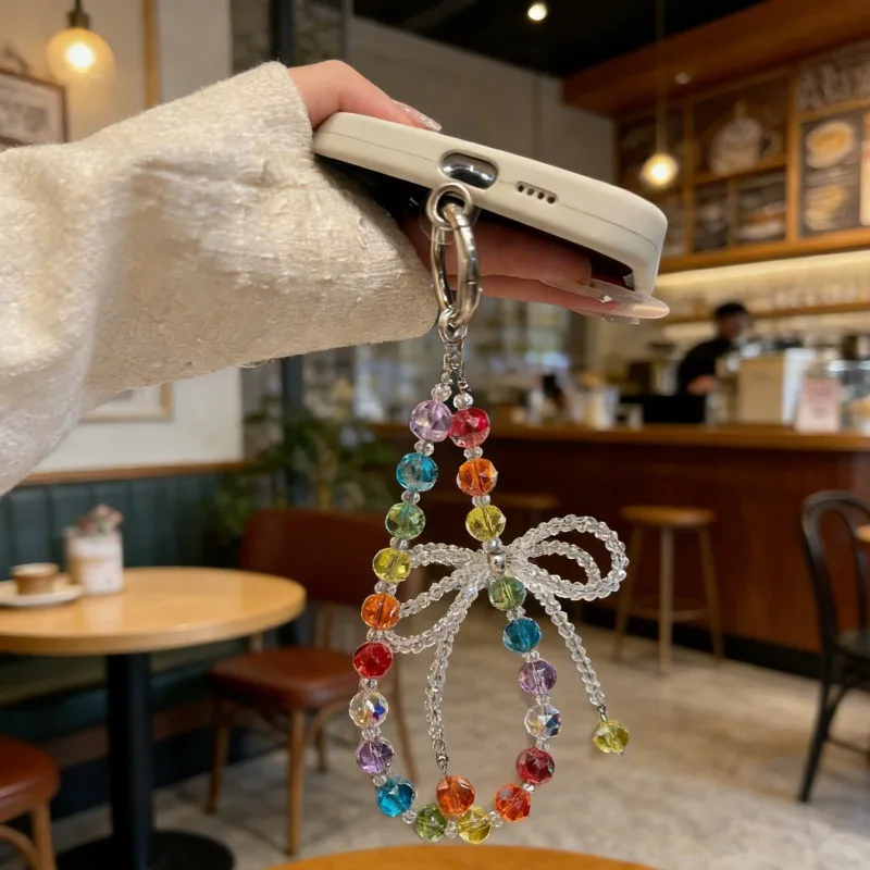 Rainbow Bow Crystal Mobile Phone Pendant Chain Short Hand-Held Luxury Accessory High-End Colored Design Fashionable Phone Strap
Rainbow Bow Crystal Mobile Phone Pendant Chain Short Hand-Held Luxury Accessory High-End Colored Design Fashionable Phone Strap