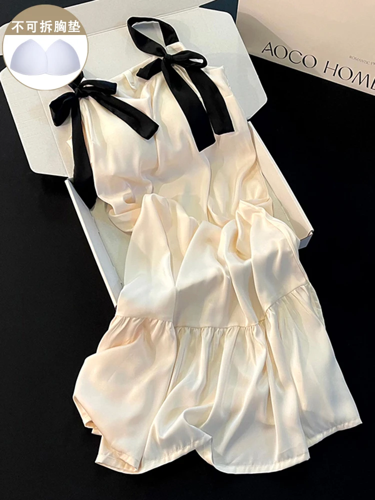 DAIMELU Ice silk pajamas women's summer with chest pads, black bows, sexy suspender pajamas, small cool loungewear Nightgown
DAIMELU Ice silk pajamas women's summer with chest pads, black bows, sexy suspender pajamas, small cool loungewear Nightgown