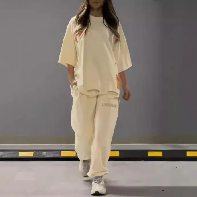 New Summer Fashion Hollow Round Neck T-shirt For Women 2-piece Solid Color Casual Casual Sports Suit Trousers Pocket Women Suit
New Summer Fashion Hollow Round Neck T-shirt For Women 2-piece Solid Color Casual Casual Sports Suit Trousers Pocket Women Suit