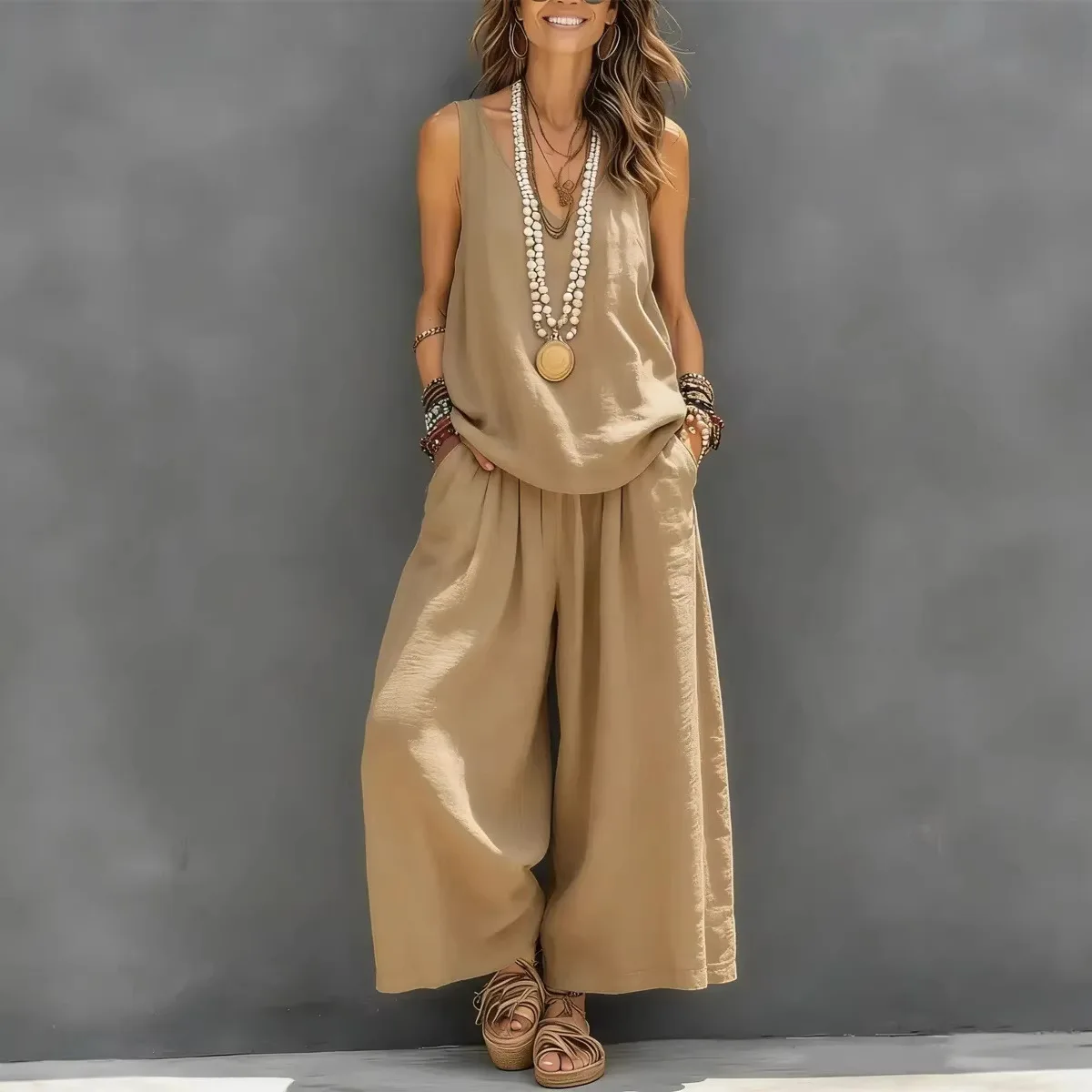 V-neck sleeveless loose pullover top with pockets high-waisted wide-leg trousers 2-piece set women's casual loose commuting suit
V-neck sleeveless loose pullover top with pockets high-waisted wide-leg trousers 2-piece set women's casual loose commuting suit