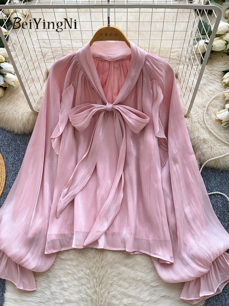 Beiyingni Senior Classy Office Ladies Blouses Solid Color Lace-up Loose Satin Tops Female 2026 Summer Korean Shirts Women Blusas
Beiyingni Senior Classy Office Ladies Blouses Solid Color Lace-up Loose Satin Tops Female 2026 Summer Korean Shirts Women Blusas