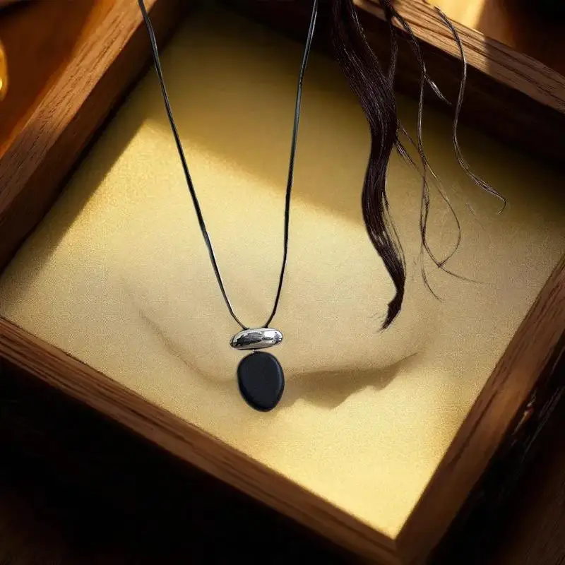 Timeless Black Wooden Oval Pendant; Ladies' Leather-Adjustable Necklace with Understated Matte Metal Block Chain for Sweaters
Timeless Black Wooden Oval Pendant; Ladies' Leather-Adjustable Necklace with Understated Matte Metal Block Chain for Sweaters