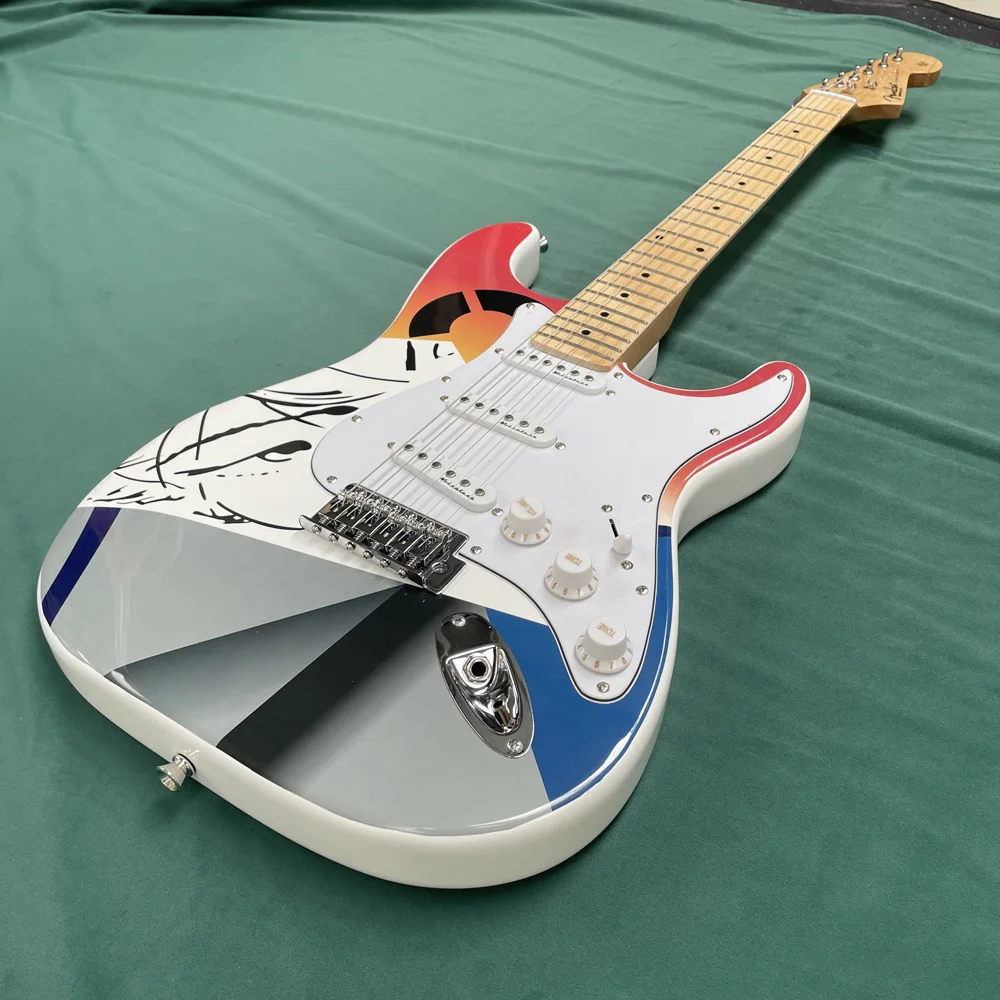 White 6-string electric guitar, with high gloss finish. Guitar solo. Colorful pastel pictures on the front and back.
White 6-string electric guitar, with high gloss finish. Guitar solo. Colorful pastel pictures on the front and back.