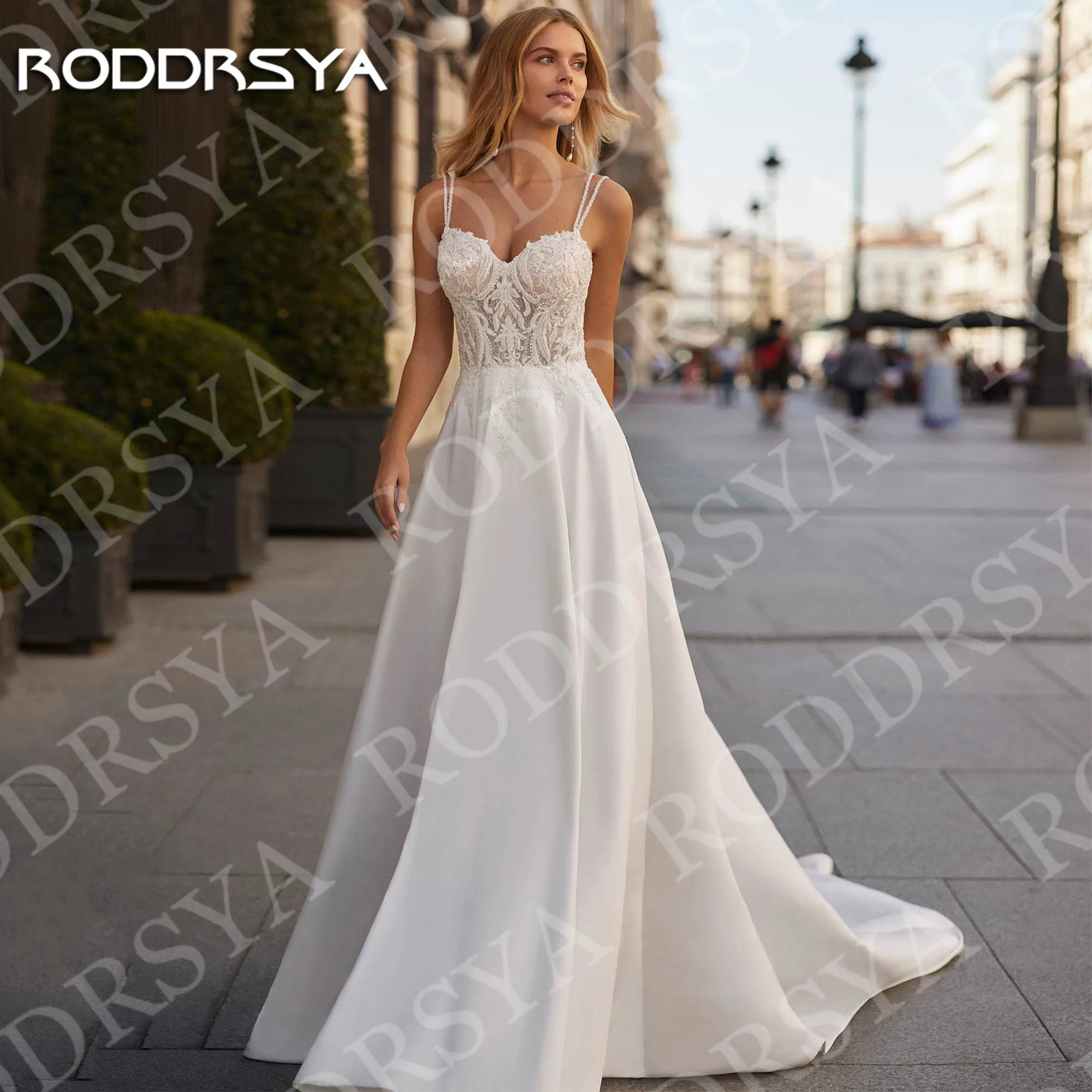RODDRSYA Sweetheart Wedding Dress Satin A Line Simple Beach Elegant Spaghetti Strap Lace Bridal Gowns Customized robe mariée
RODDRSYA Sweetheart Wedding Dress Satin A Line Simple Beach Elegant Spaghetti Strap Lace Bridal Gowns Customized robe mariée