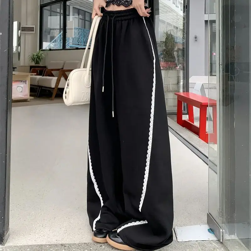 Korean version of lace splicing lazy style loose wide-leg pants versatile ties casual pants for women
Korean version of lace splicing lazy style loose wide-leg pants versatile ties casual pants for women