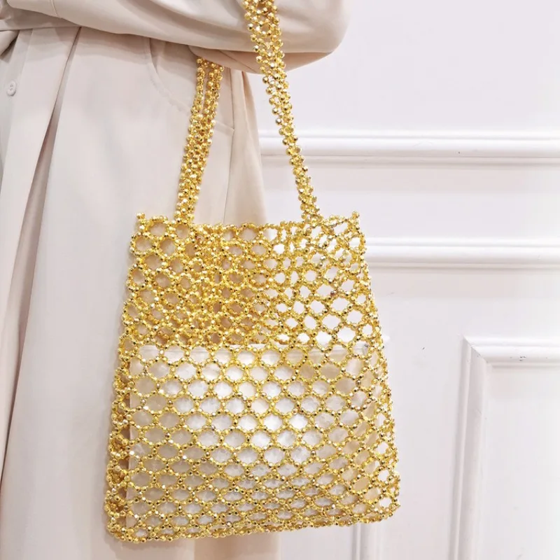 Fashionable Golden Acrylic Beaded Single-shoulder Bag Handwoven Hollow Beach Bag Large Capacity Simple Mobile Phone Clutches Bag
Fashionable Golden Acrylic Beaded Single-shoulder Bag Handwoven Hollow Beach Bag Large Capacity Simple Mobile Phone Clutches Bag