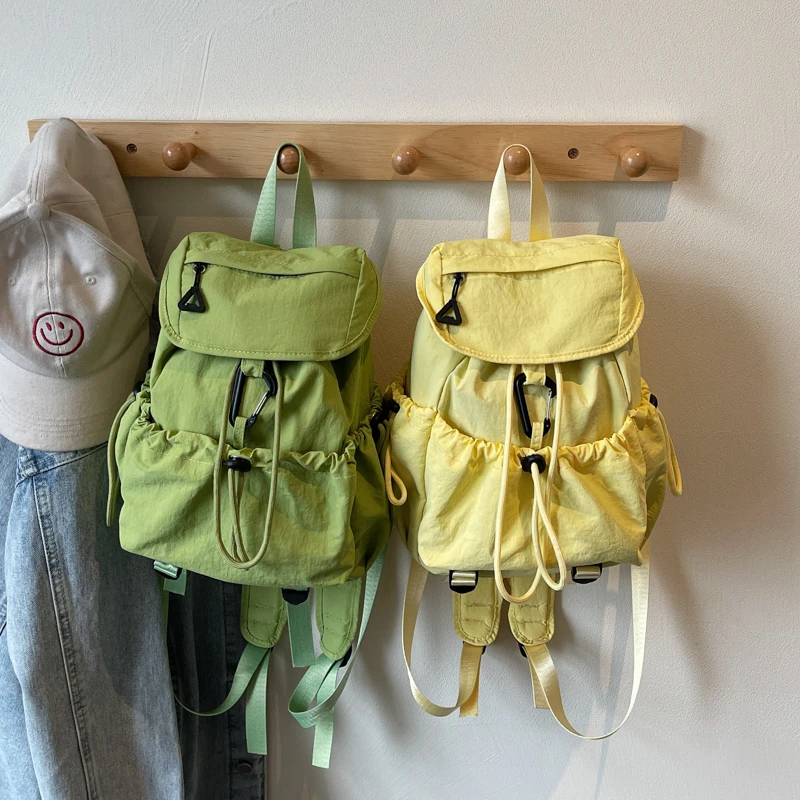 2026 Spring/summer Bright Color Small Soft Cloth Backpack College Students Simple School Bag Casual Drawstring Travel Backpack
2026 Spring/summer Bright Color Small Soft Cloth Backpack College Students Simple School Bag Casual Drawstring Travel Backpack