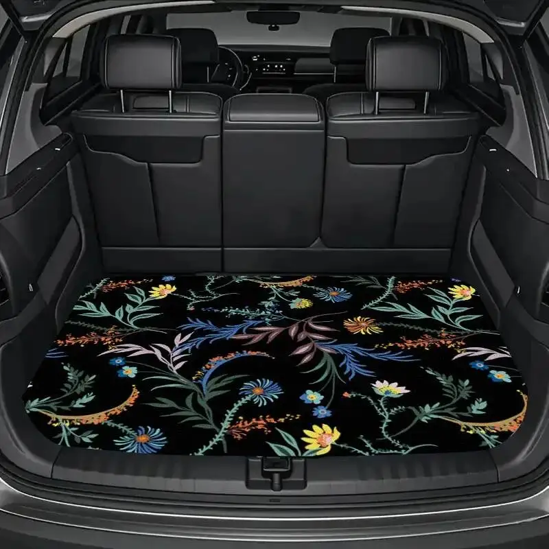 A Floral Printed Car Trunk Mat - Made of Durable Polyester, Featuring a Stylish Black And Blue Floral Design
A Floral Printed Car Trunk Mat - Made of Durable Polyester, Featuring a Stylish Black And Blue Floral Design