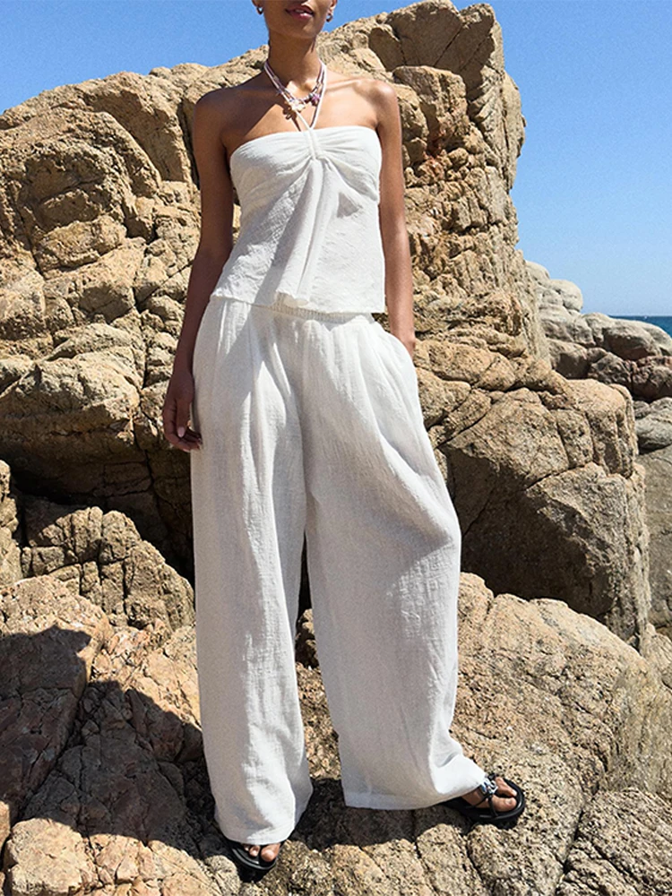 Solid Halter Women's Pant Suit Backless Sleeveless Lace Up Top Loose Waist Wide Leg Pants Female 2 Pieces Summer Lady Outfits
Solid Halter Women's Pant Suit Backless Sleeveless Lace Up Top Loose Waist Wide Leg Pants Female 2 Pieces Summer Lady Outfits