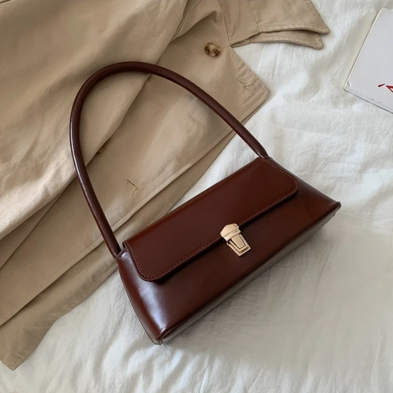 Французские элегантные женские сумки из искусственной кожи, универсальные однотонные дамские сумочки, винтажная женская сумка через плечо с клапаном
Французские элегантные женские сумки из искусственной кожи, универсальные однотонные дамские сумочки, винтажная женская сумка через плечо с клапаном