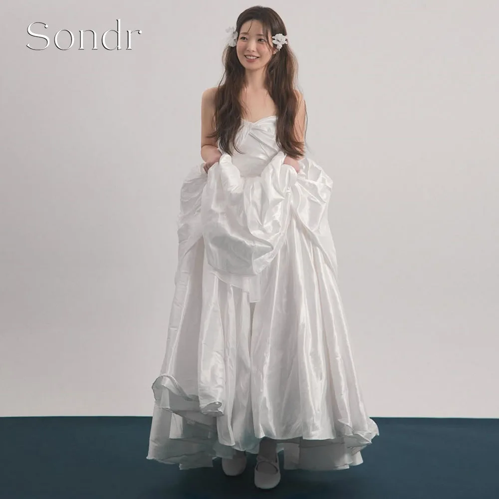 Sondr Customized A Line Taffeta Korean Wedding Dresses Strapless Tiered Bridal Gown Photo Shoot Wedding Anniversary Gown 2026
Sondr Customized A Line Taffeta Korean Wedding Dresses Strapless Tiered Bridal Gown Photo Shoot Wedding Anniversary Gown 2026