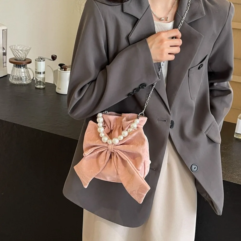 Fashion Elegant Drawstring Bucket Bag Pearl Chain Sweet Big Bowknot Shoulder Bag Handbag Solid Color Crossbody Bag Travel
Fashion Elegant Drawstring Bucket Bag Pearl Chain Sweet Big Bowknot Shoulder Bag Handbag Solid Color Crossbody Bag Travel