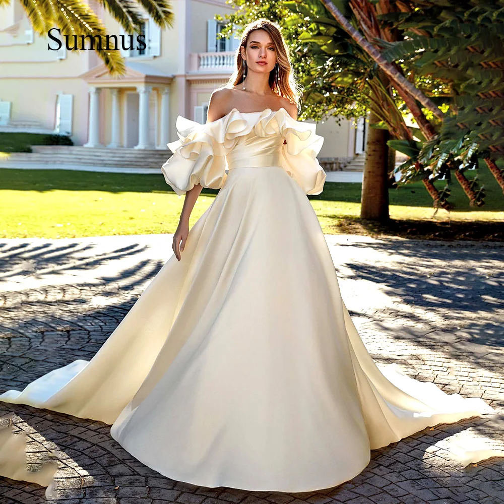 Sumnus Satin Princess Wedding Dress Short Sleeve Ruffles Strapless Bride Dresses Long Train A Line Wedding Gowns Button Backless
Sumnus Satin Princess Wedding Dress Short Sleeve Ruffles Strapless Bride Dresses Long Train A Line Wedding Gowns Button Backless