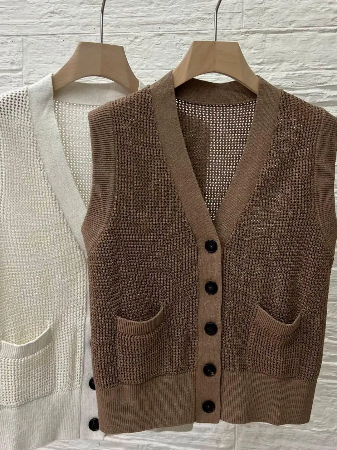 Elegant V-neck casual knitted hollowed out sleeveless knitted vest top
Elegant V-neck casual knitted hollowed out sleeveless knitted vest top