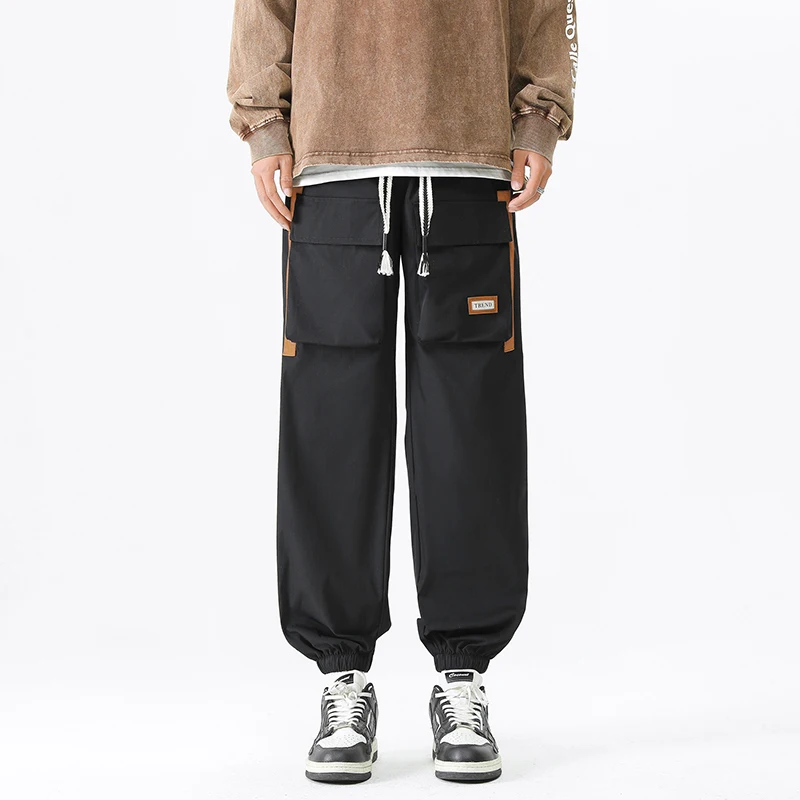 Men's workwear pants with multiple pockets, American street retro trendy brand, ankle tied casual sports pants, long pants
Men's workwear pants with multiple pockets, American street retro trendy brand, ankle tied casual sports pants, long pants