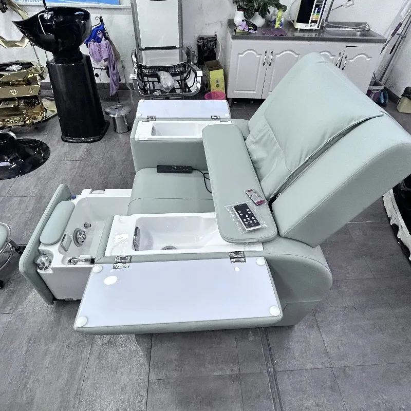 Deluxe pedicure chair with heated basin massage and spa function, suitable for nail salon plastic and ceramic salon furniture
Deluxe pedicure chair with heated basin massage and spa function, suitable for nail salon plastic and ceramic salon furniture