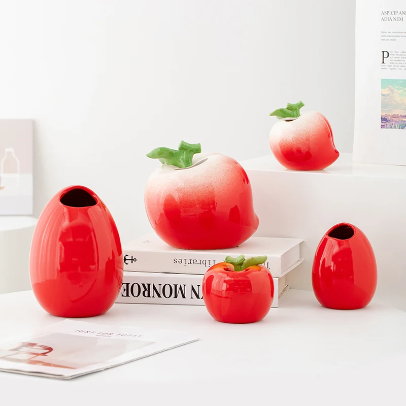 Creative and adorable fruit ceramic vase - perfect for placing flowers in the living room. It features a luxurious and high-end
Creative and adorable fruit ceramic vase - perfect for placing flowers in the living room. It features a luxurious and high-end