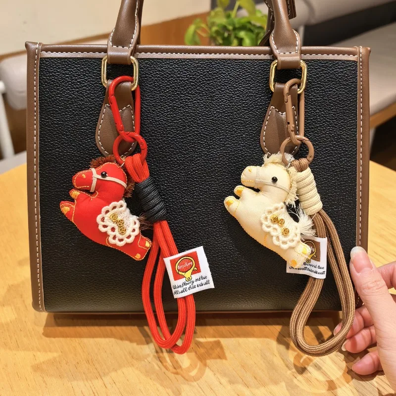 Handmade Fabric Red Pony Keychain Bag Charm Lanyard Cartoon Niche Style Stuffed Plush Pendant for Purse Gift Premium Quality
Handmade Fabric Red Pony Keychain Bag Charm Lanyard Cartoon Niche Style Stuffed Plush Pendant for Purse Gift Premium Quality