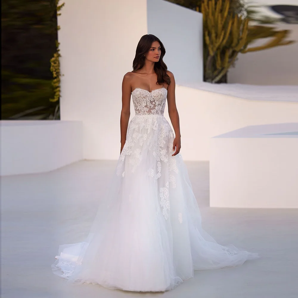 Boho Sweetheart Collar Tulle Wedding Dress with Appliques Lace Backless Sweep Court A-line Wedding Party Gowns Customized
Boho Sweetheart Collar Tulle Wedding Dress with Appliques Lace Backless Sweep Court A-line Wedding Party Gowns Customized