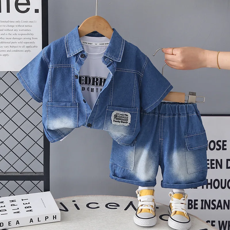 2026 Summer Kids Boys 3 Piece Outfits Denim Jacket + Letter Print T-shirt + Cargo Shorts Set Toddler Baby Boy Streetwear Clothes
2026 Summer Kids Boys 3 Piece Outfits Denim Jacket + Letter Print T-shirt + Cargo Shorts Set Toddler Baby Boy Streetwear Clothes