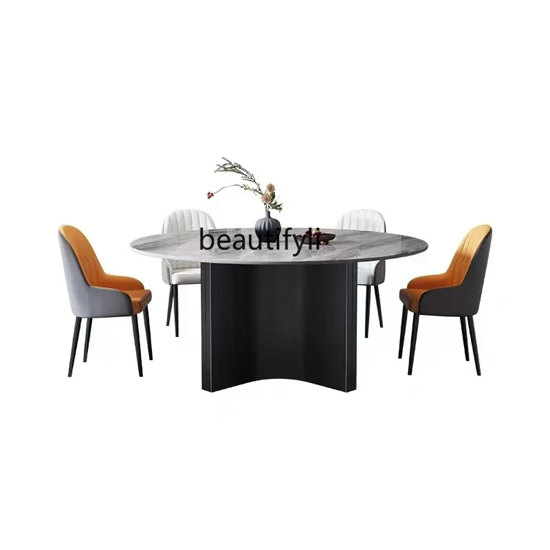 High-end round rock slab dining table, modern simple small apartment western dining table Italian light luxury dining table
High-end round rock slab dining table, modern simple small apartment western dining table Italian light luxury dining table