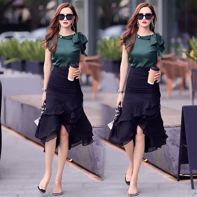 Fashionable Half-Skirt Set Women's Summer New Style Ruffle Hem Asymmetrical Cap Sleeve Top And Skirt Ensemble Trendy Outfit
Fashionable Half-Skirt Set Women's Summer New Style Ruffle Hem Asymmetrical Cap Sleeve Top And Skirt Ensemble Trendy Outfit