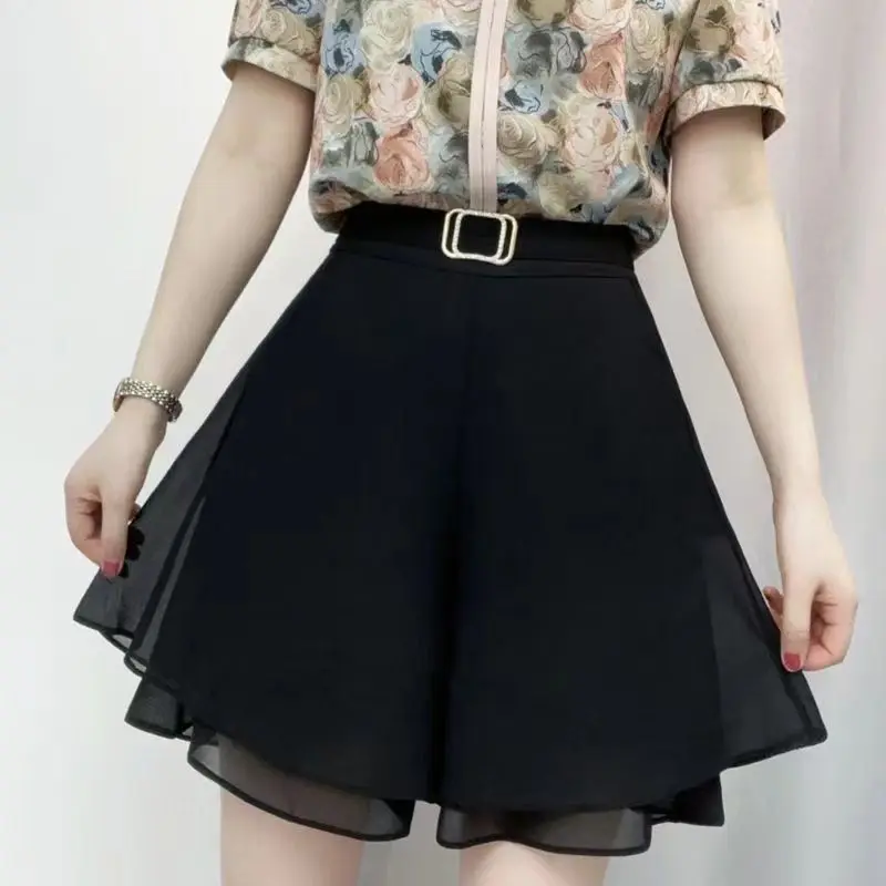 Летние модные универсальные однотонные шорты с высокой талией нестандартной формы, женские офисные женские простые широкие брюки с эластичной резинкой на талии
Летние модные универсальные однотонные шорты с высокой талией нестандартной формы, женские офисные женские простые широкие брюки с эластичной резинкой на талии