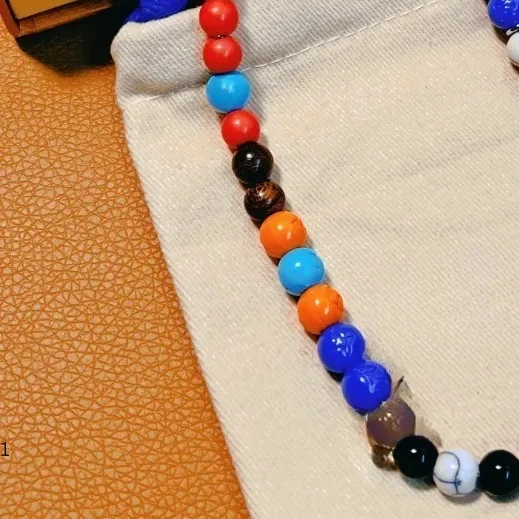 New Products in 2024 with Adjustable Irregular Wooden and Resin Bead Chains, with Metal Markings and Colored Decorative Pendants
New Products in 2024 with Adjustable Irregular Wooden and Resin Bead Chains, with Metal Markings and Colored Decorative Pendants