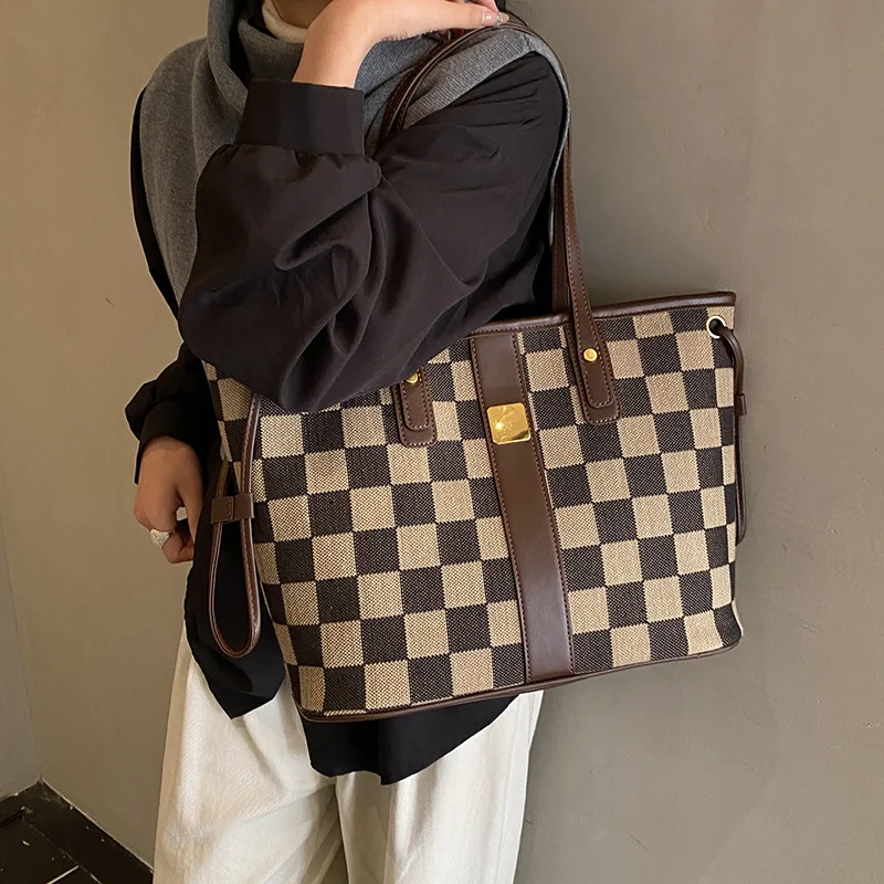 Checkered Fabric Tote - Dual Handles and Chain Strap, Roomy Interior with Multiple Pockets for Daily Essentials
Checkered Fabric Tote - Dual Handles and Chain Strap, Roomy Interior with Multiple Pockets for Daily Essentials