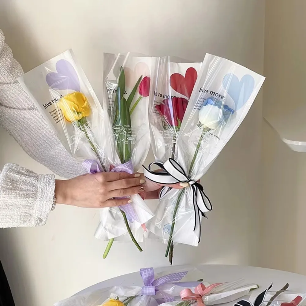 20pcs Love Shaped Single Flower Wrapping Bags Romantic Opp Bag Floral Gift Bags Waterproof Bouquet Packaging Bags Room Decor
20pcs Love Shaped Single Flower Wrapping Bags Romantic Opp Bag Floral Gift Bags Waterproof Bouquet Packaging Bags Room Decor