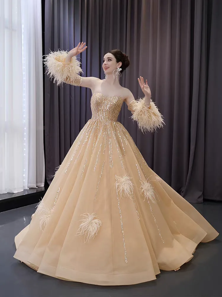 Beige Beated Evening dress with feathers, mobiles Sleeve Fare strapless dress
Beige Beated Evening dress with feathers, mobiles Sleeve Fare strapless dress
