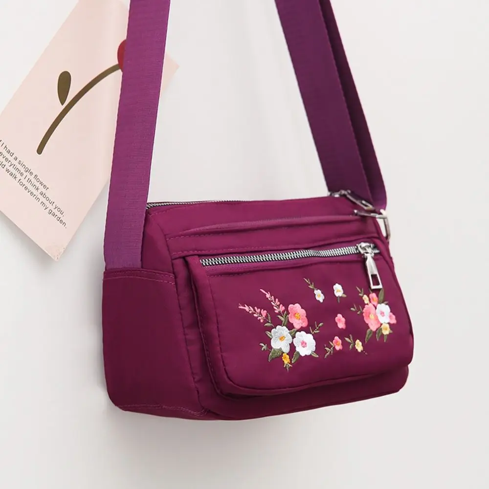 Simple Nylon Shoulder Bag Zipper Closure Large Capacity Mom Crossbody Bag Embroidery Flower Wear Resistant Messenger Bag Outdoor
Simple Nylon Shoulder Bag Zipper Closure Large Capacity Mom Crossbody Bag Embroidery Flower Wear Resistant Messenger Bag Outdoor
