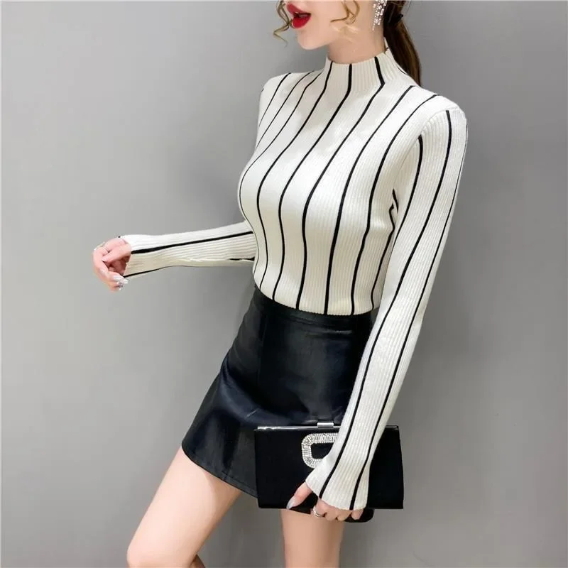 2025 Autumn and Winter New Slim Tight Knitted Top Half-high Collar Vertical Striped Base Sweater for Women
2025 Autumn and Winter New Slim Tight Knitted Top Half-high Collar Vertical Striped Base Sweater for Women