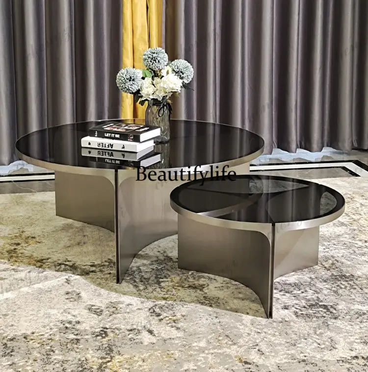 Italian minimalist postmodern creative villa designer model house furniture light luxury tempered glass round coffee table
Italian minimalist postmodern creative villa designer model house furniture light luxury tempered glass round coffee table