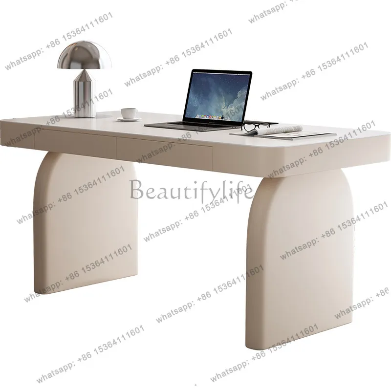 Французский кремовый компьютерный стол в современном стиле, простой и элегантный, для кабинета.
Французский кремовый компьютерный стол в современном стиле, простой и элегантный, для кабинета.