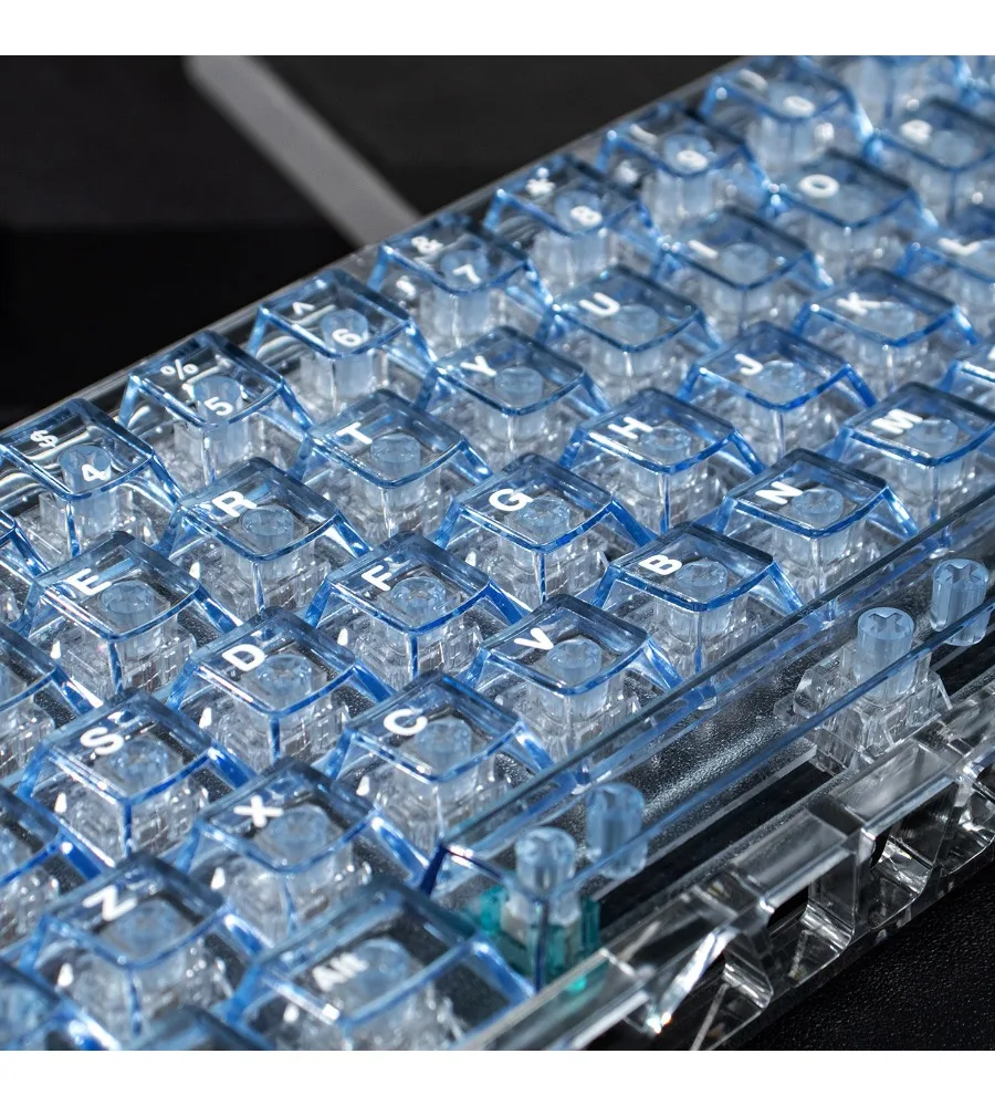 Light blue transparent mechanical keyboard keycaps are engraved with light PC pad printing customization original Wooting/Mega
Light blue transparent mechanical keyboard keycaps are engraved with light PC pad printing customization original Wooting/Mega