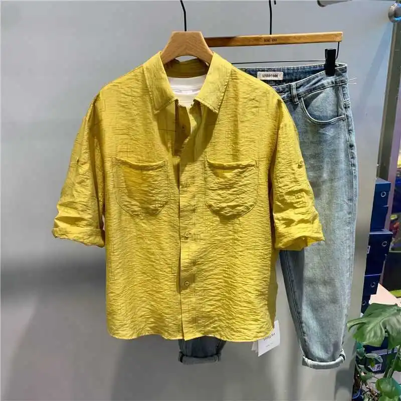 Mens Solid Color Textured Button Down Shirt Turn Down Collar Roll Up Sleeve Casual Blouse with Chest Pockets
Mens Solid Color Textured Button Down Shirt Turn Down Collar Roll Up Sleeve Casual Blouse with Chest Pockets