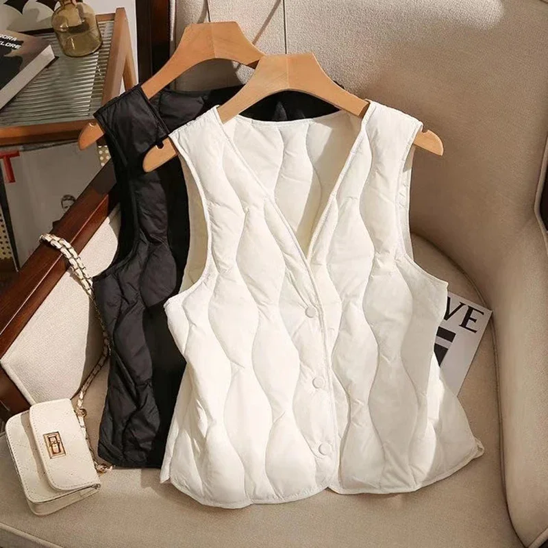 Women Solid Button Up Sleeveless Coat Thicken Casual Loose Warm Vest V-neck Fall Office Cotton Vest Winter Thermal Waistcoat Y2K
Women Solid Button Up Sleeveless Coat Thicken Casual Loose Warm Vest V-neck Fall Office Cotton Vest Winter Thermal Waistcoat Y2K