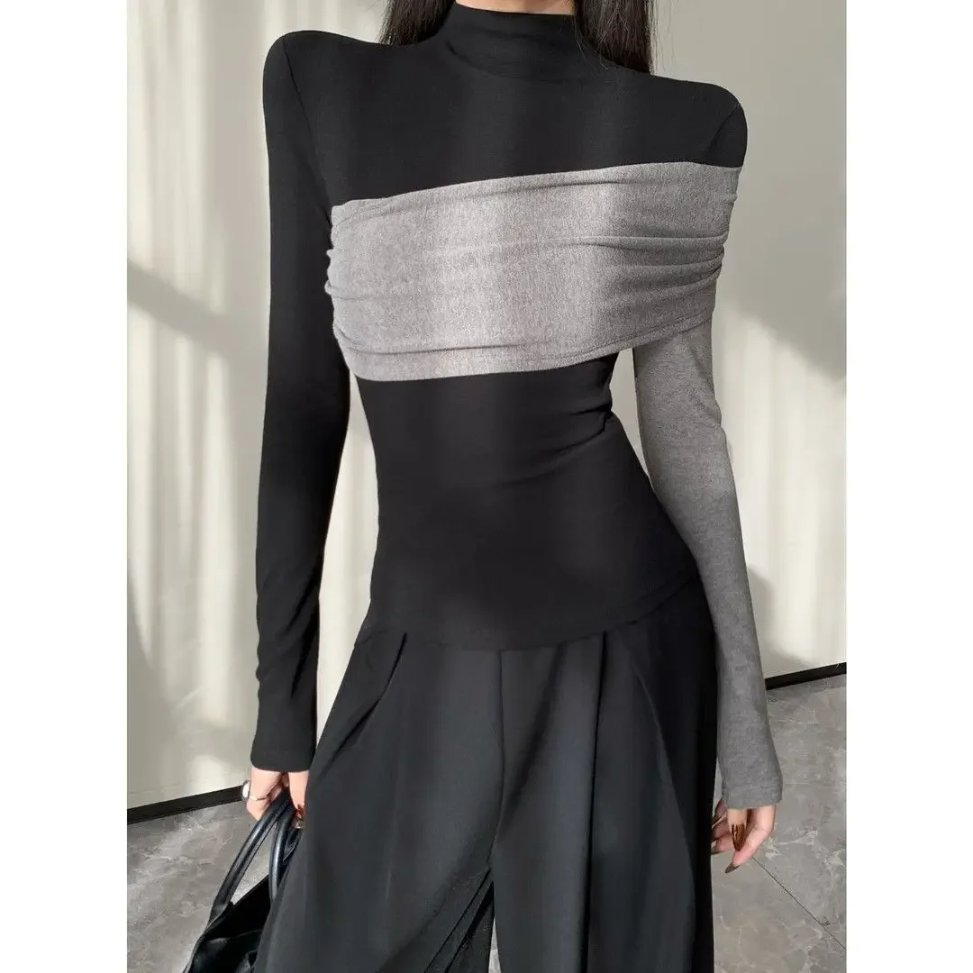 Korean sexy long-sleeved T-shirt women's autumn and winter new semi-high-necked fashion slim contrast with bottoming shirt.
Korean sexy long-sleeved T-shirt women's autumn and winter new semi-high-necked fashion slim contrast with bottoming shirt.