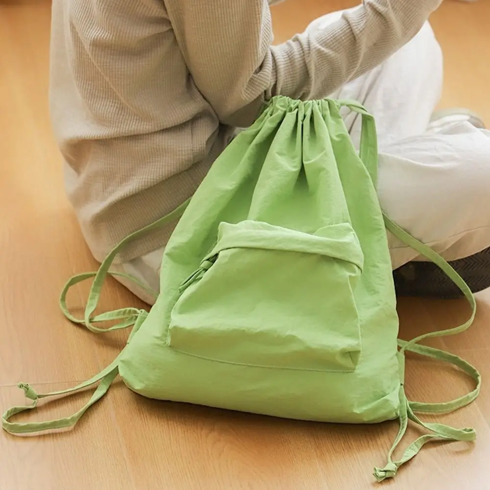 Korean Style Drawstring Backpack Portable Type Large Capacity Nylon Backpack Niche Design Solid Color Cloth Shoulder Bag Travel
Korean Style Drawstring Backpack Portable Type Large Capacity Nylon Backpack Niche Design Solid Color Cloth Shoulder Bag Travel